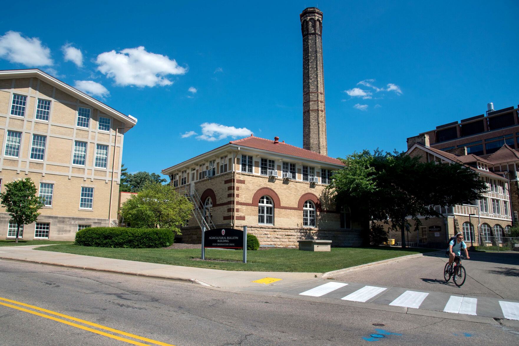 A biker passes through the Observatory Hill area of the University of Wisconsin-Madison